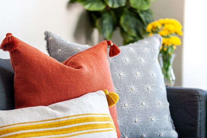 close up of pillows on warm and cozycouch