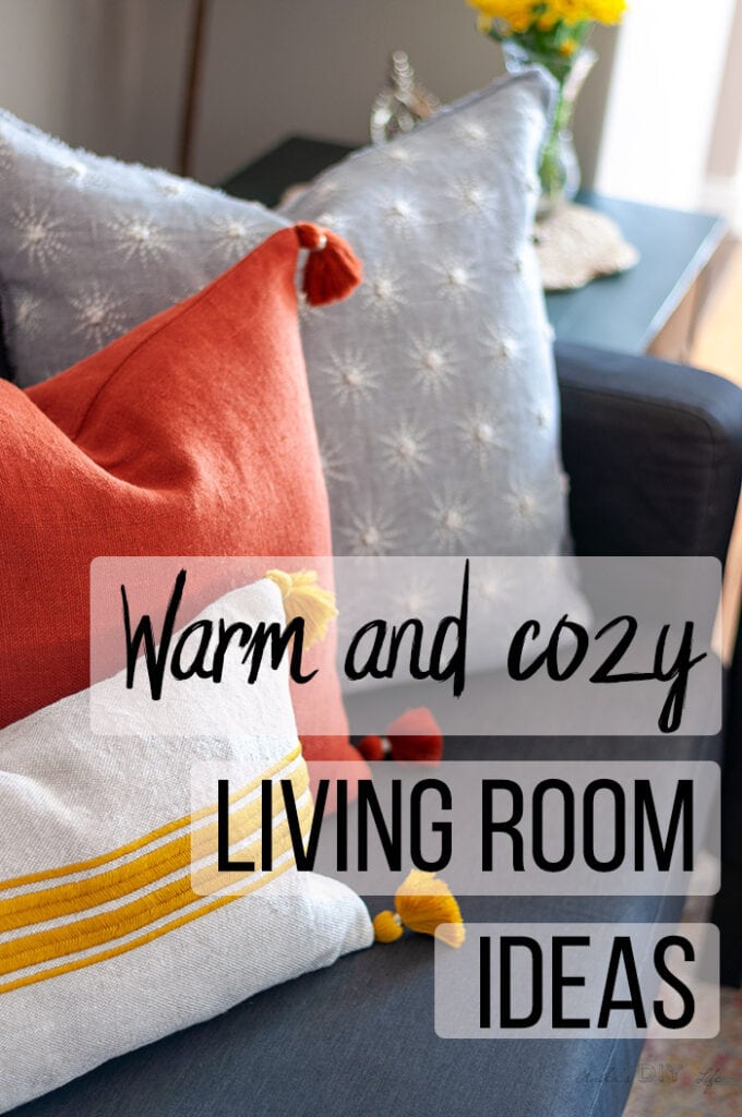 close up of pillows in a warm and cozy living room with text overlay