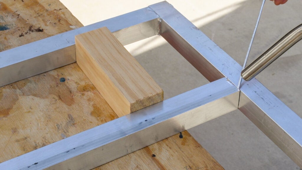 using a spacer between two metal