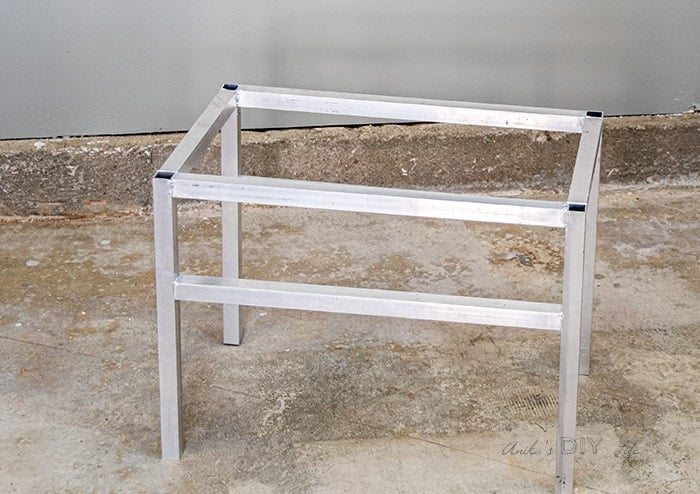 completed metal frame in garage hallway