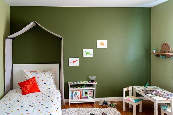 Kids room with DIY tent canopy and nature theme