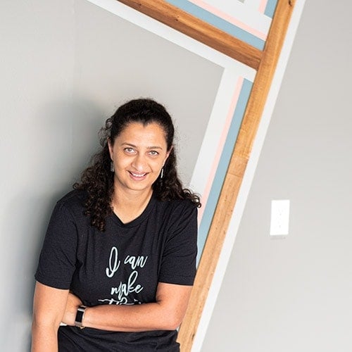 Learn how to create a gorgeous DIY accent wall with paint and wood by painting stripes on the wall. Plus see what my garage accent wall looks like now!