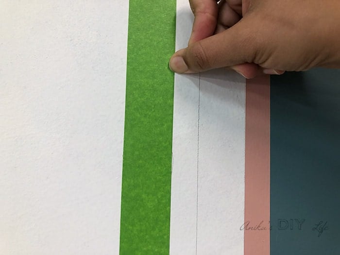 Burnishing edge of tape to paint accent wall