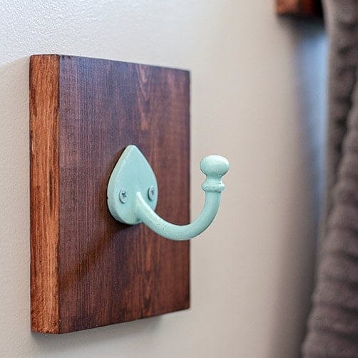 These DIY bathroom towel hooks are a really simple and quick 15-minute upgrade project for your bathroom. Replace an existing towel bar or add new storage with style!
