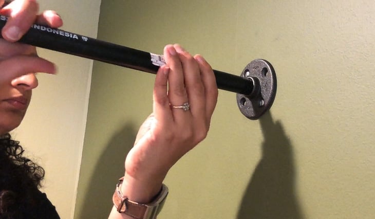 attaching the steel tube to the floor flange for the DIY canopy tent over bed