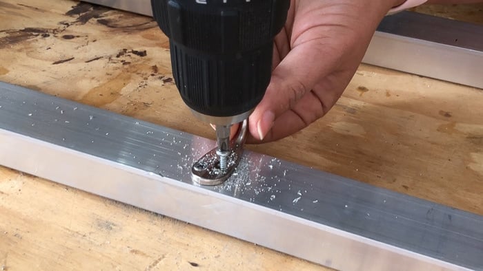 Adding hooks to the aluminum coat rack