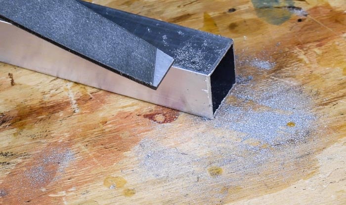 filing aluminum to prepare for metal brazing