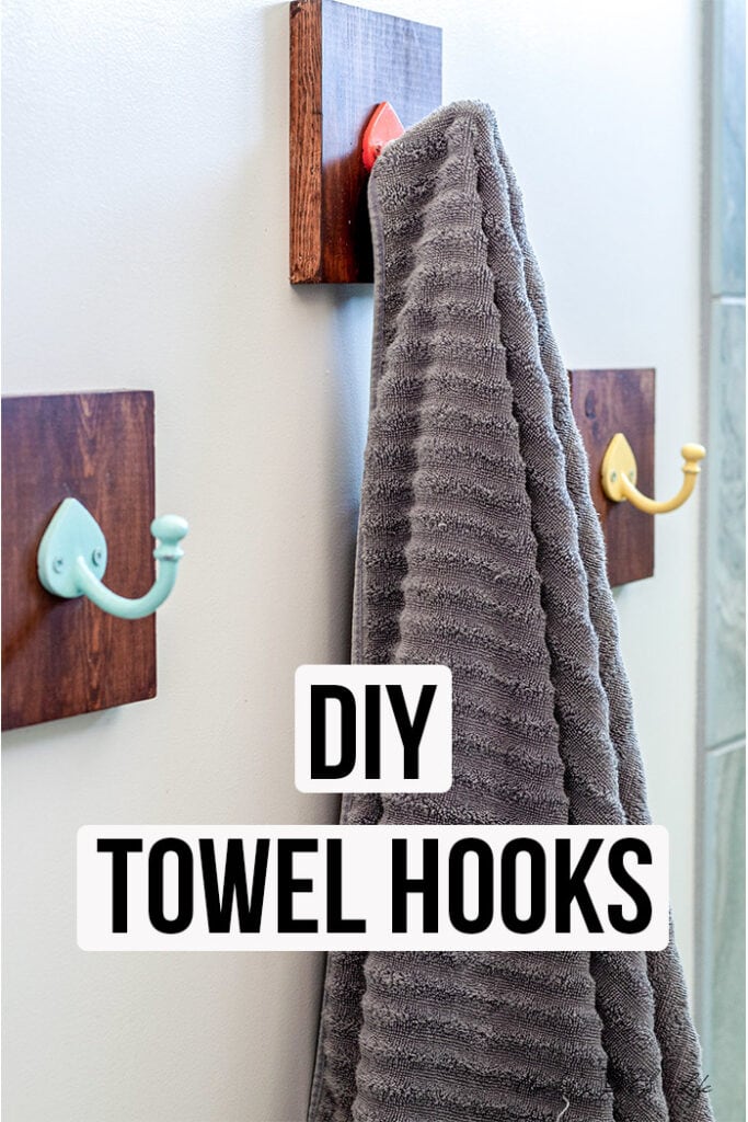 DIY Bathroom towel hooks with towel hanging and text overlay