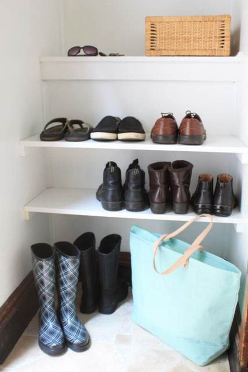 DIY shoe organizing shelves built into the closet