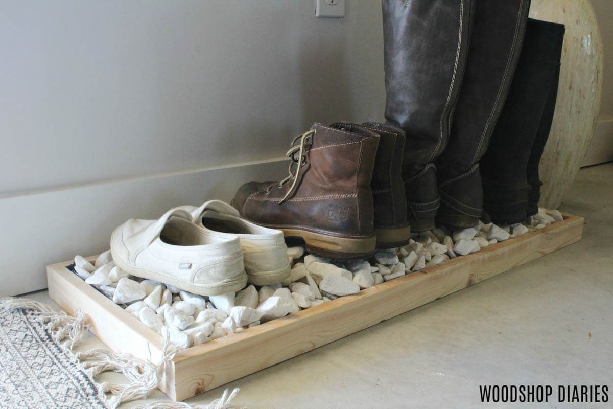 Organizing boot tray with rocks