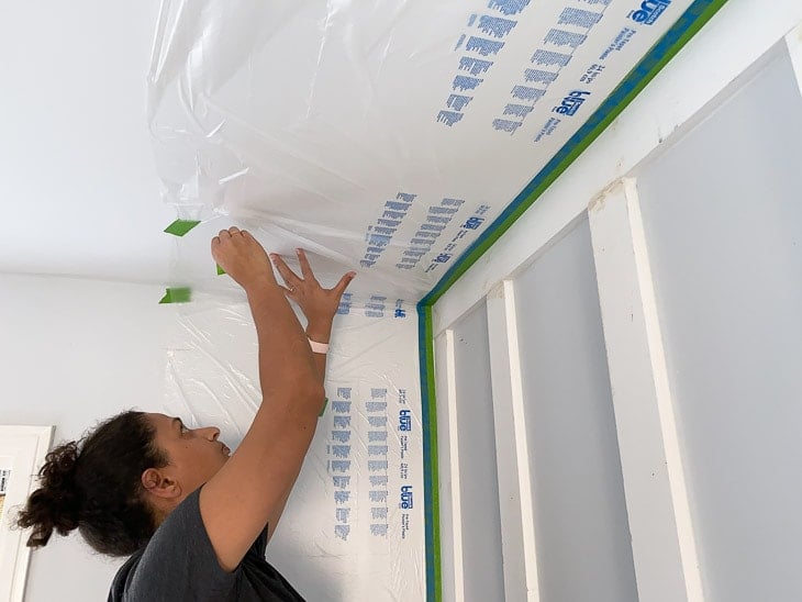 Covering walls to paint a DIY board and batten wall.