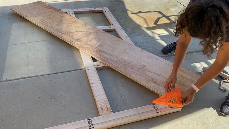 aligning plywood for DIY plywood headboard