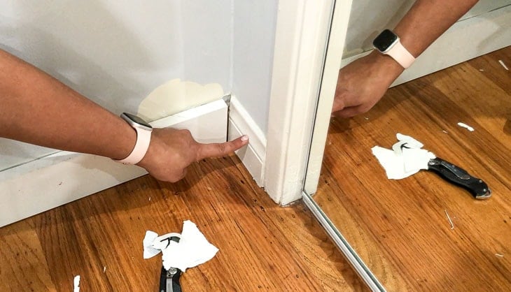 removing baseboards from the adjoining wall for board and batten