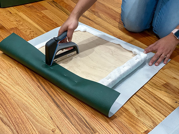 Upholstering top of the DIY storage ottoman cube