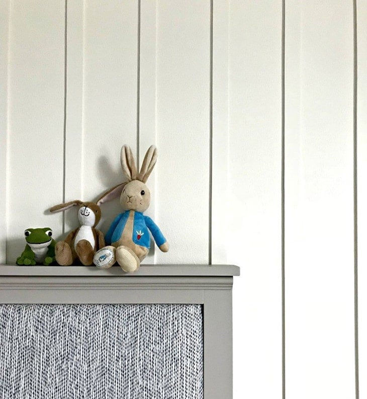 White board and batten wall with kids toys