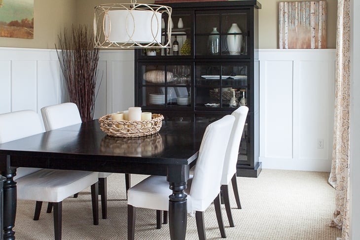 traditional white board and batten around a dining room wall