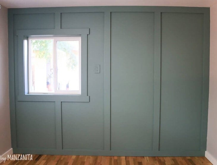 Dark gray board and batten full wall in a small room empty
