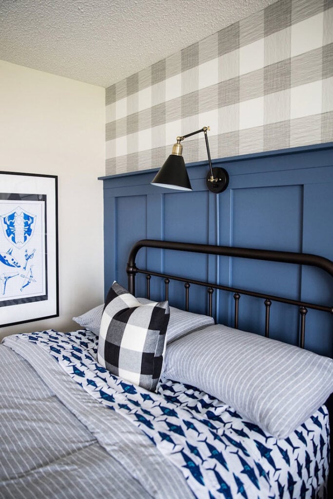 blue half wall board and batten in boy room.