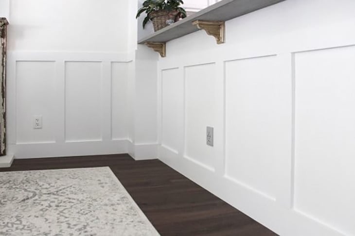 Simple low board and batten wall with shelf on top