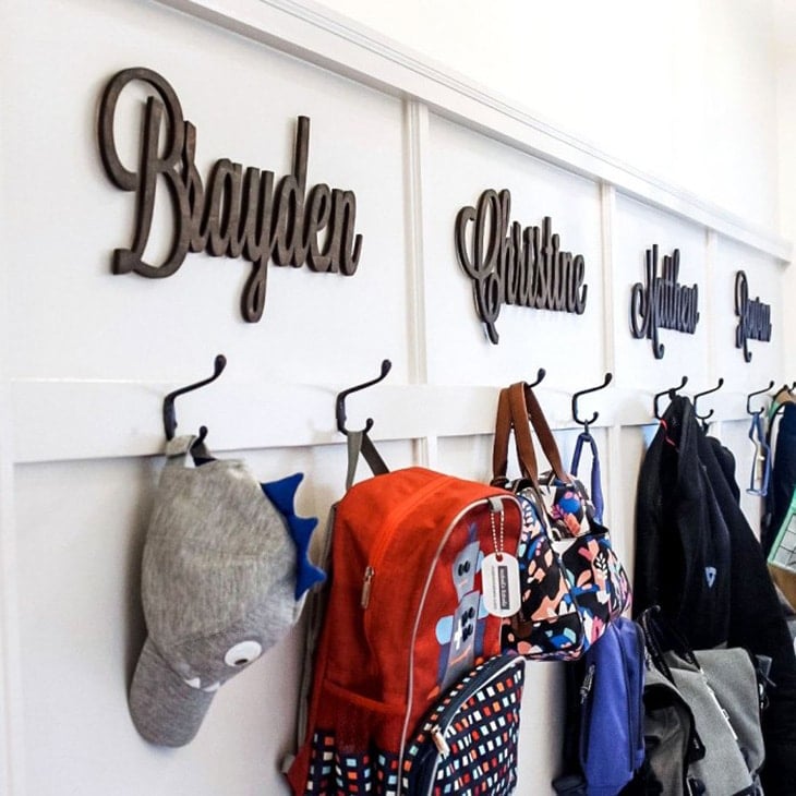 white board and batten with hooks and cutout names
