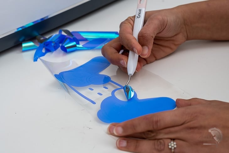 removing iron on vinyl to make custom backpacks
