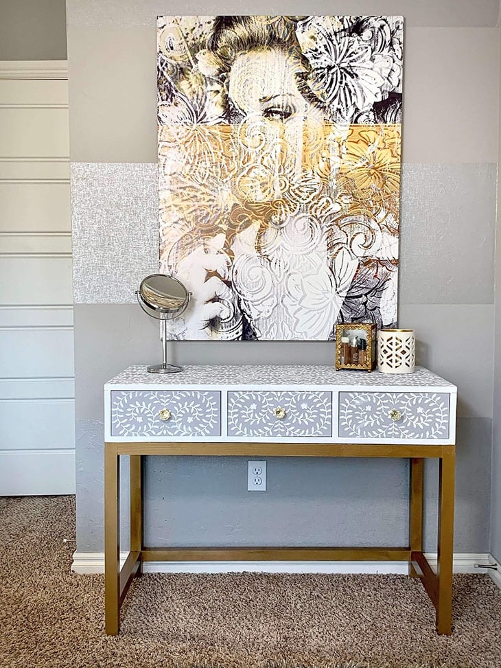 DIY vanity desk with 3 drawers with glass knobs and stenciled surface