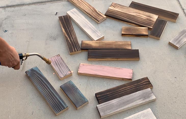 torching painted pieces of wood