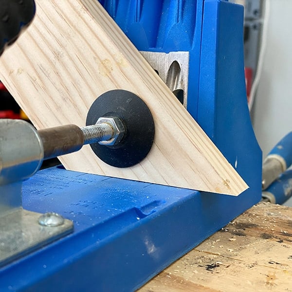 Learn how to make pocket holes in angled boards using a Kreg Jig. Get all the details using pocket holes in miter and bevel joints.