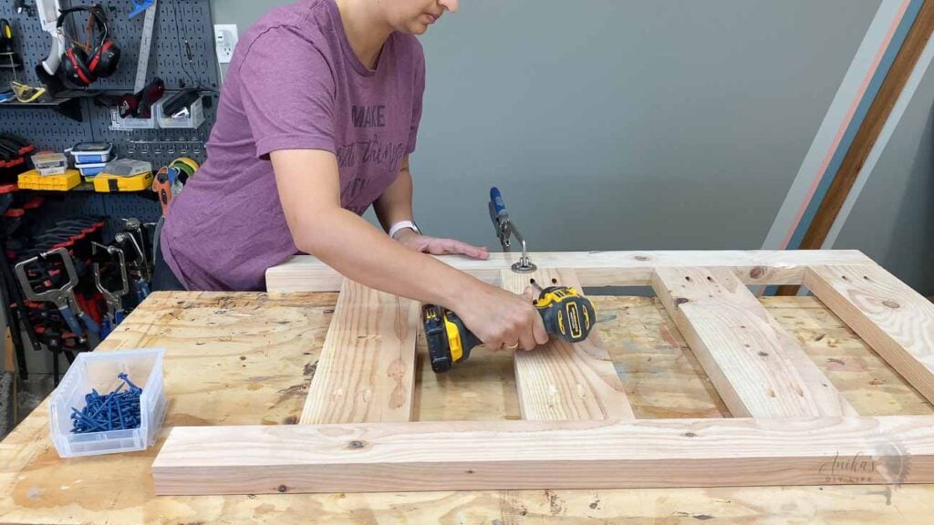 attaching 2x4 legs to the 2x6slats using pocket hole screws