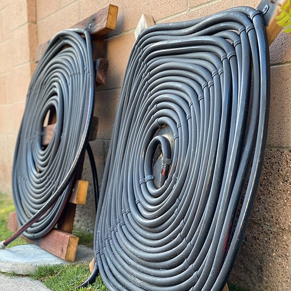 Learn how to make a DIY solar pool heater using inexpensive material in a weekend. This complete step by step tutorial and video is perfect for beginners.