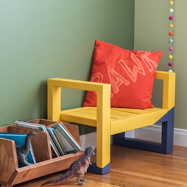 Yellow DIY kids bench in a green kids room