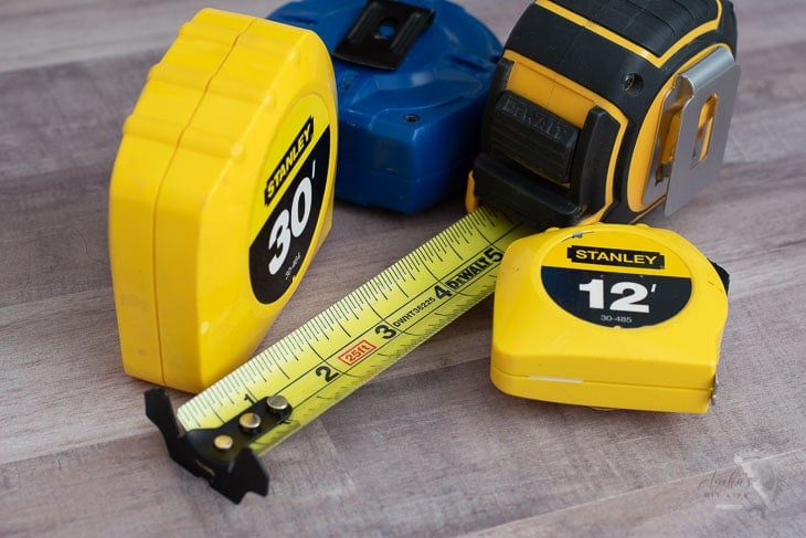 Tape measure on a wood table