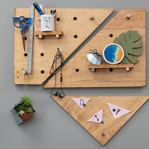 Learn how to make a DIY plywood pegboard and a magnetic board using scrap plywood to create a modern organizer. It is perfect for any room or space!
