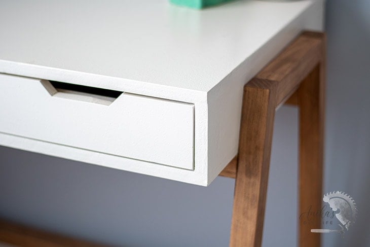 Close up of painted plywood desk showing how to paint plywood for a smooth finish