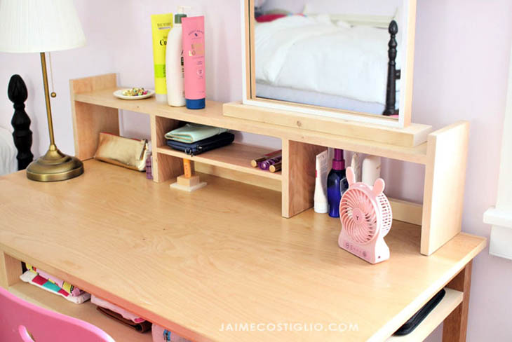 desktop shelf with 3 sections stretching all the way across the desk