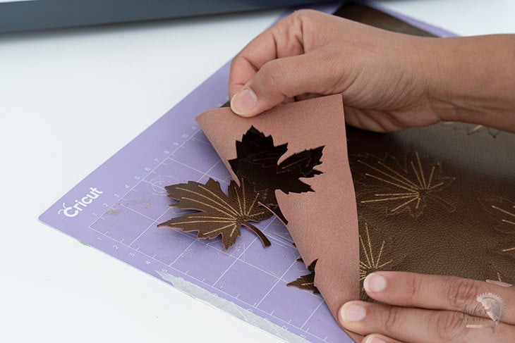 removing faux leather from Cricut mat to make a fall wreath