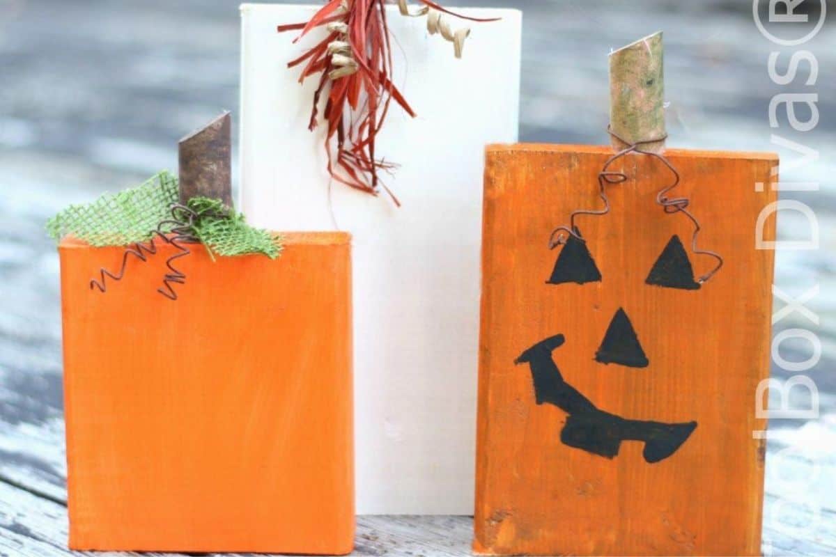 wooden pumpkins made from 1X6 scrap wood painted orange
