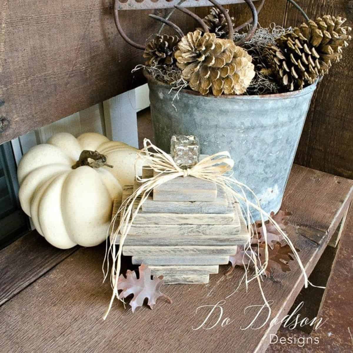 distressed wood blocks stacked to make a wooden pumpkin