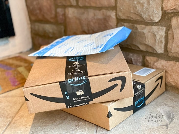 Amazon boxes at a doorstep