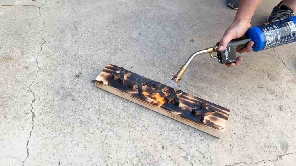 Torching the X and O using a propane blow torch