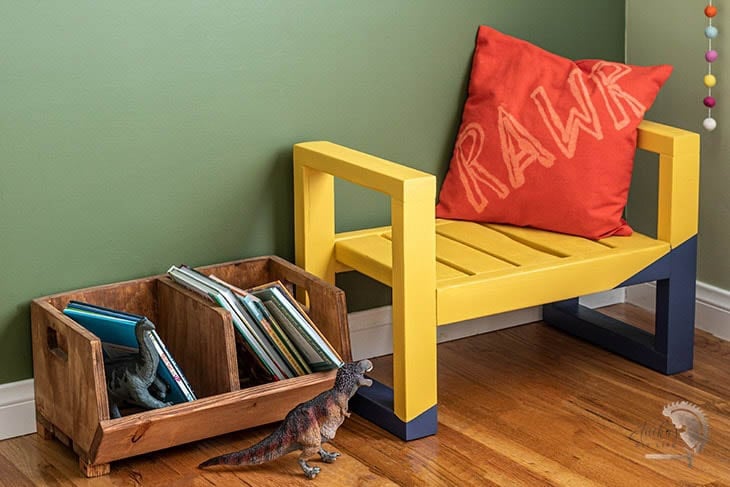 DIY kids modern bench seat painted yellow with red pillow