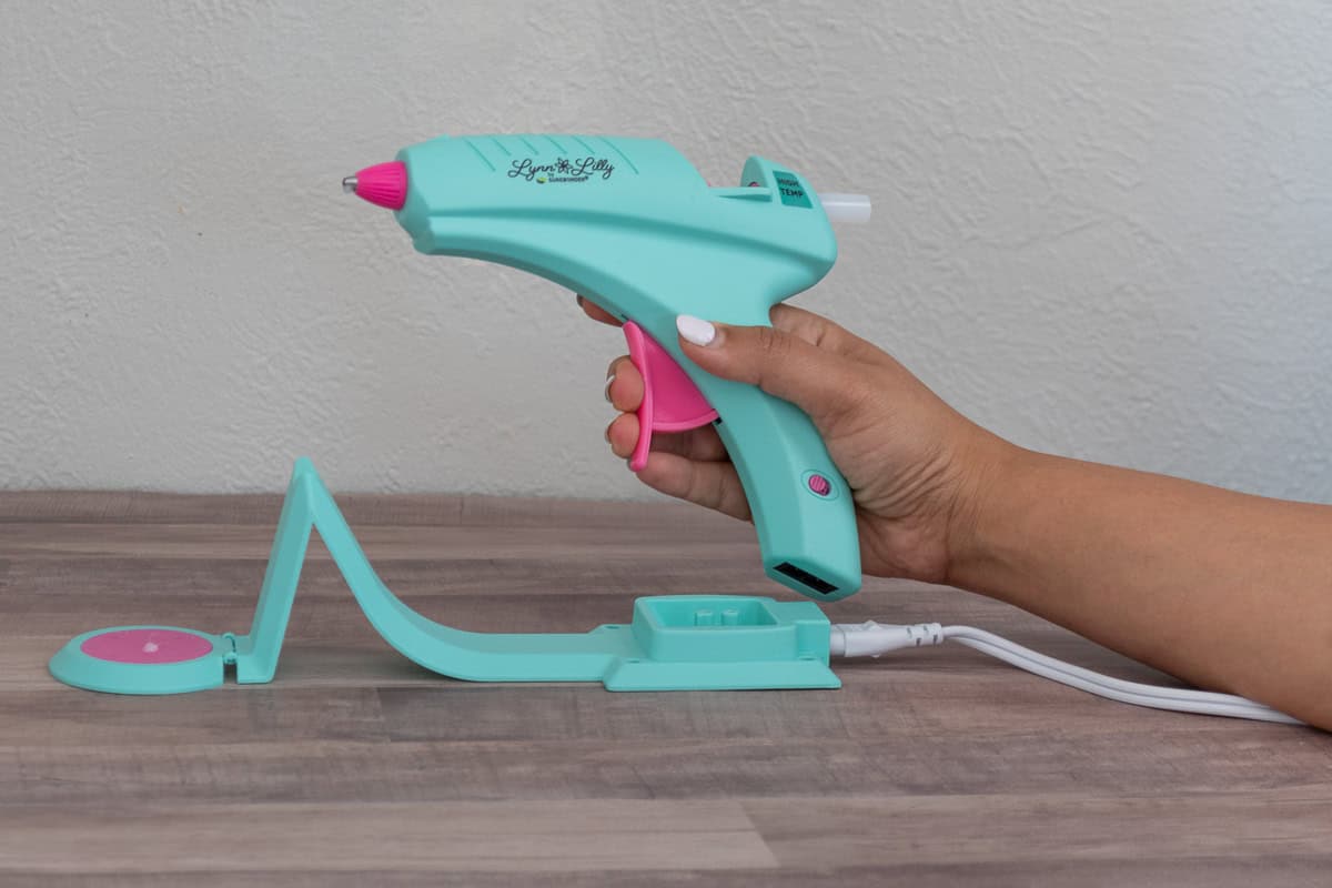 lynn lily cordless glue gun on a wood table
