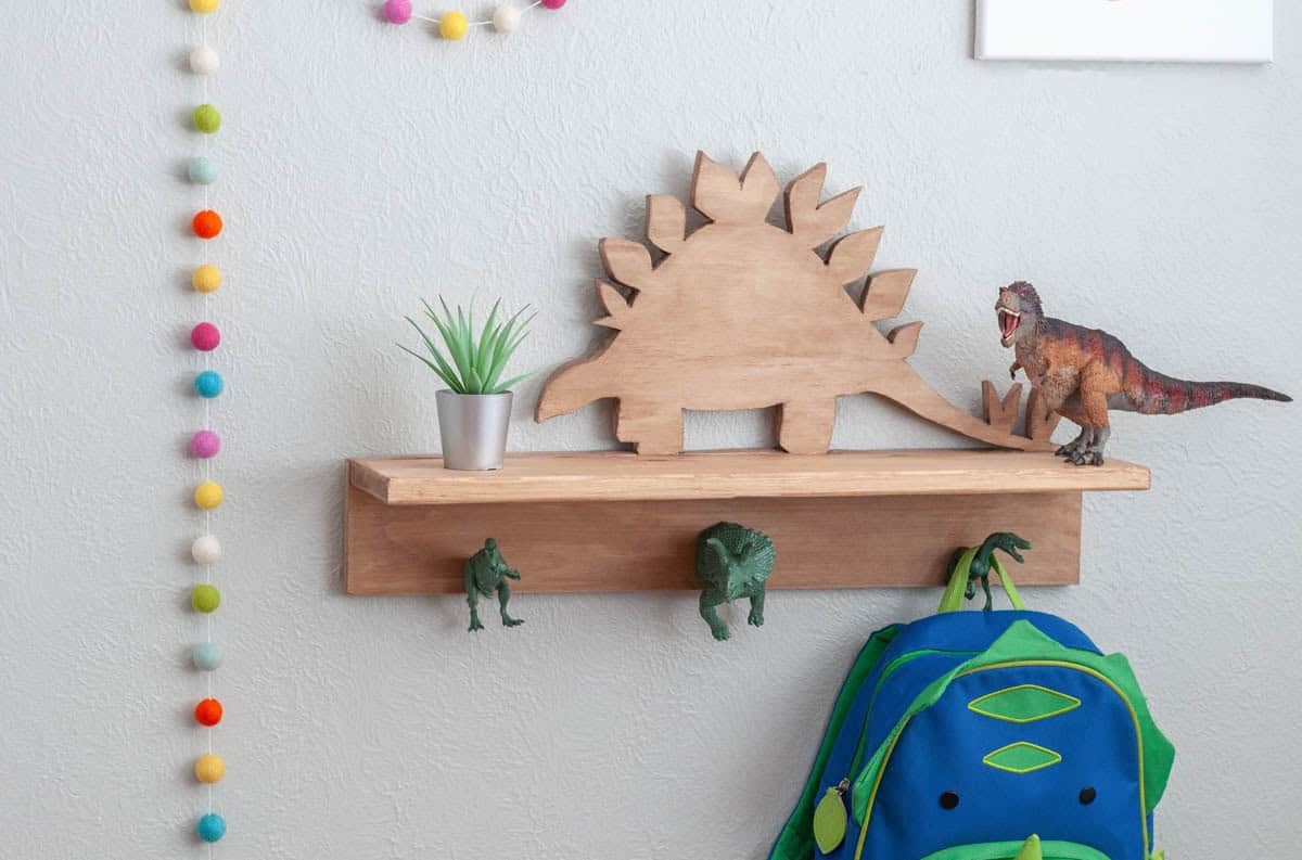 DIY wooden dinosaur shelf