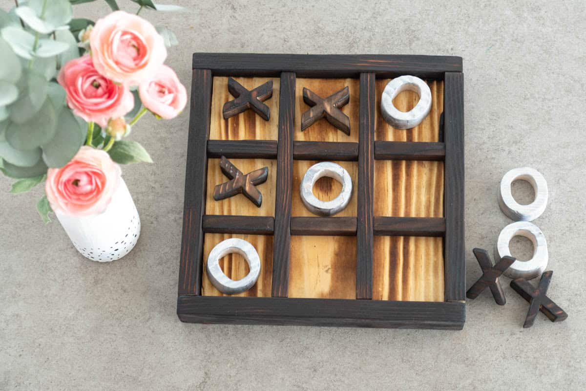 Image of DIY wood tic tac toe game board and pieces