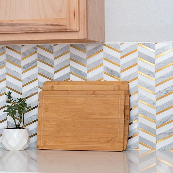 Learn how to install a mosaic kitchen backsplash using the MusselBound Adhesive Tile Mat. It is a great way for beginners to get started with tiling!