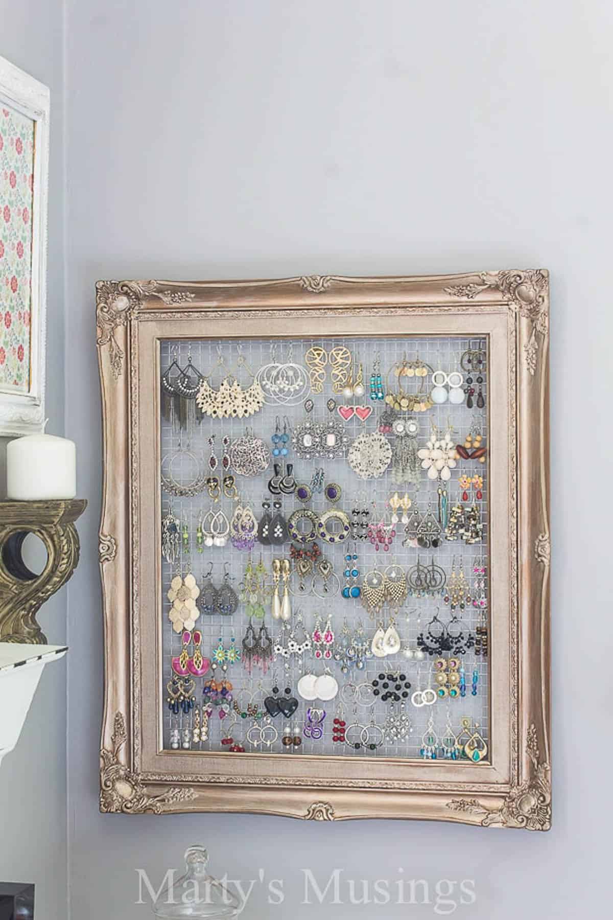 vintage picture frame as a jewelry organizer