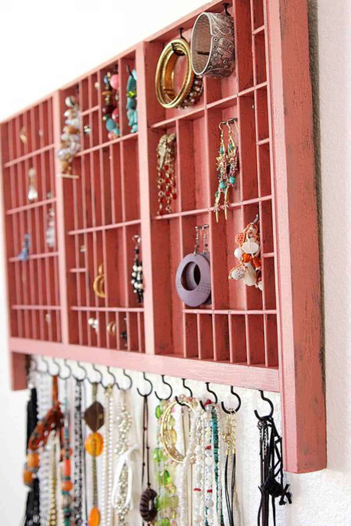 Vintage printer tray used as a jewelry organizer
