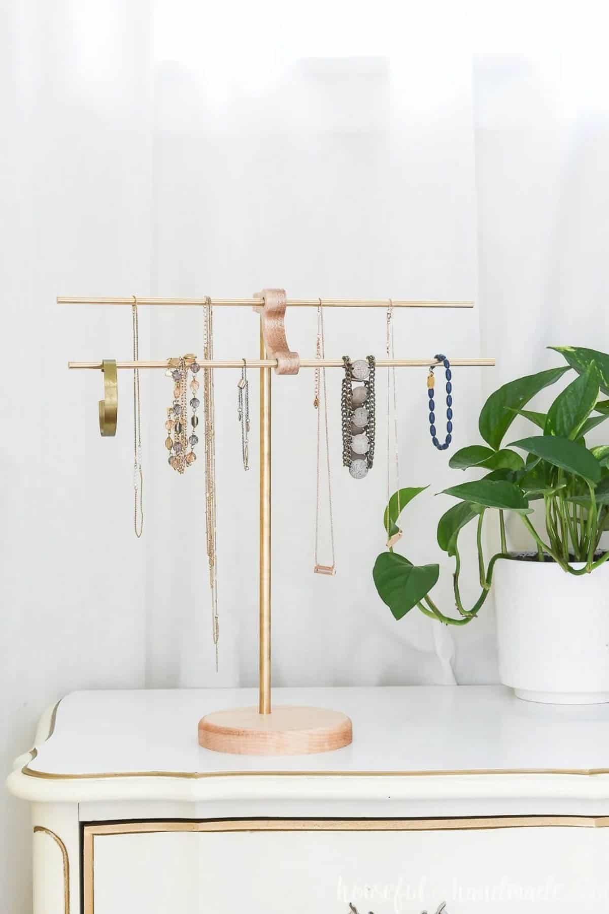 DIY necklace holder made from wood scraps