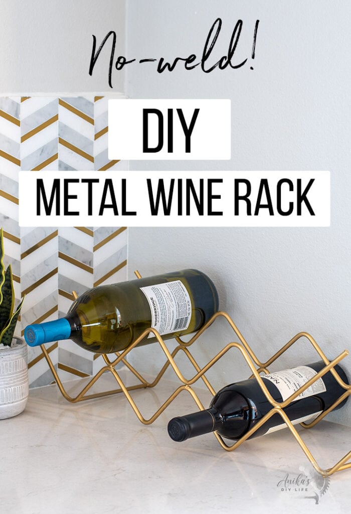 DIY metal wine rackon a counter with text overlay