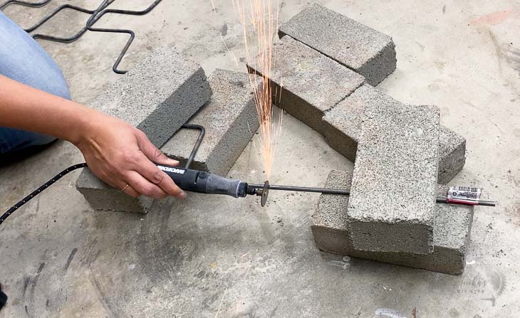 Cutting the steel rod using a rotary tool